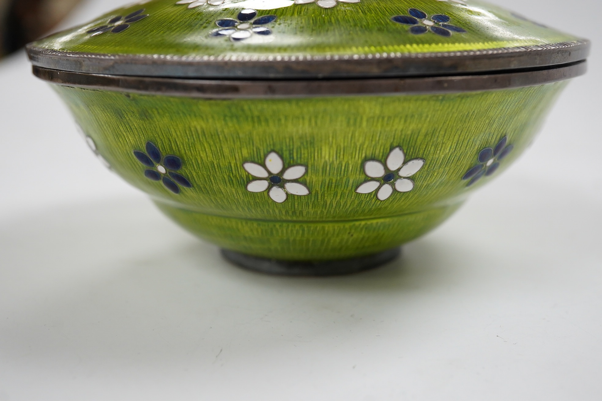 A Korean white metal and enamelled circular pot and cover, diameter 11cm, gross weight 7.6oz. Condition - fair to good